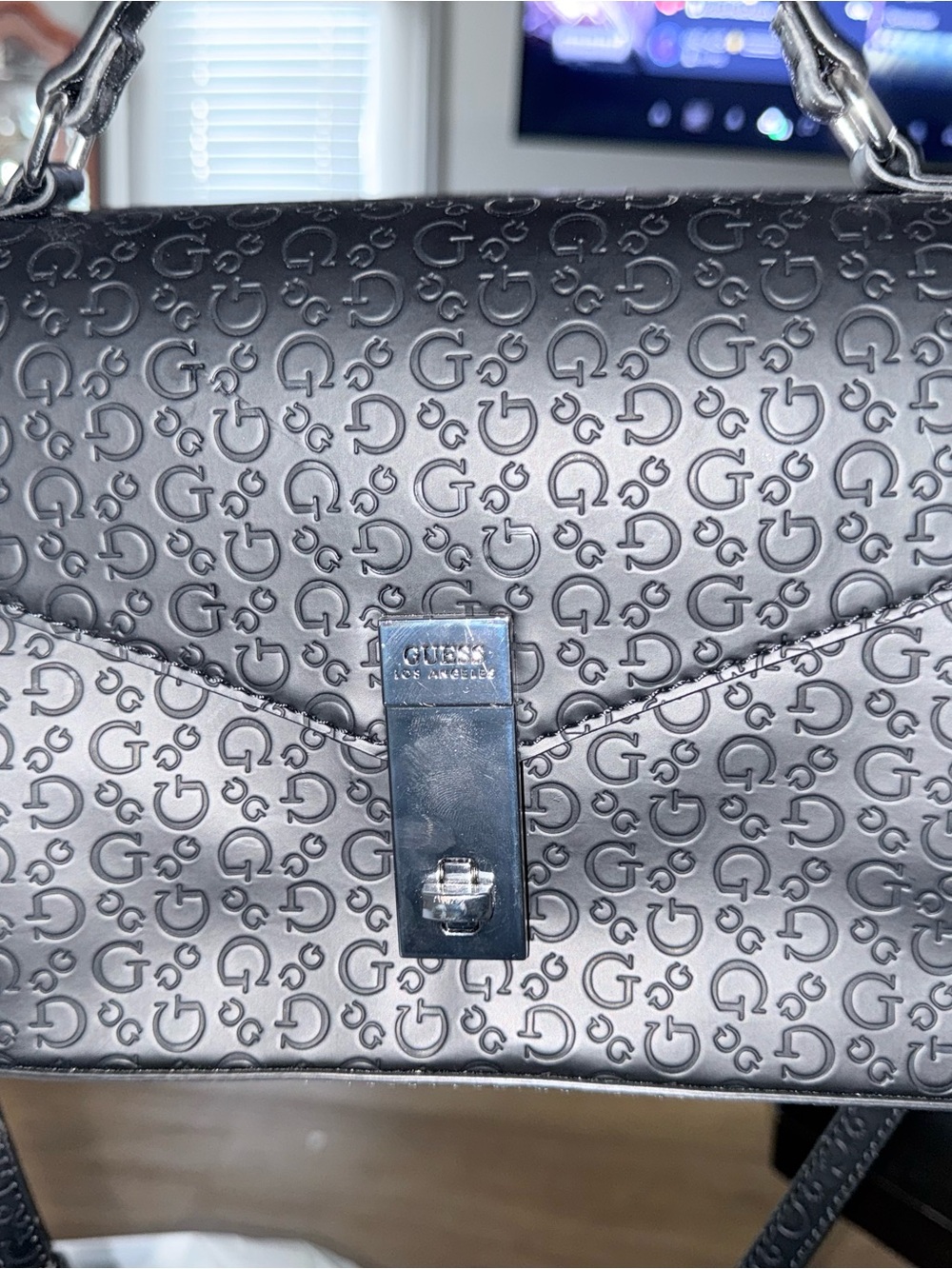 GUESS Black Embossed Logo Shoulder Bag with Silver Hardware